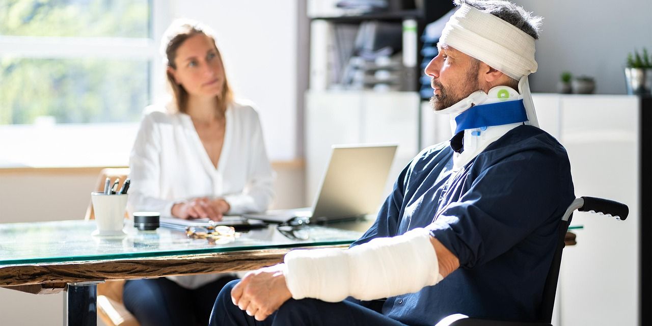 Catastrophic injury client receiving support from a legal expert